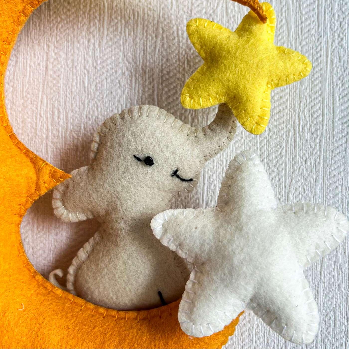 Baby Ellie on a Moon Name Hanging