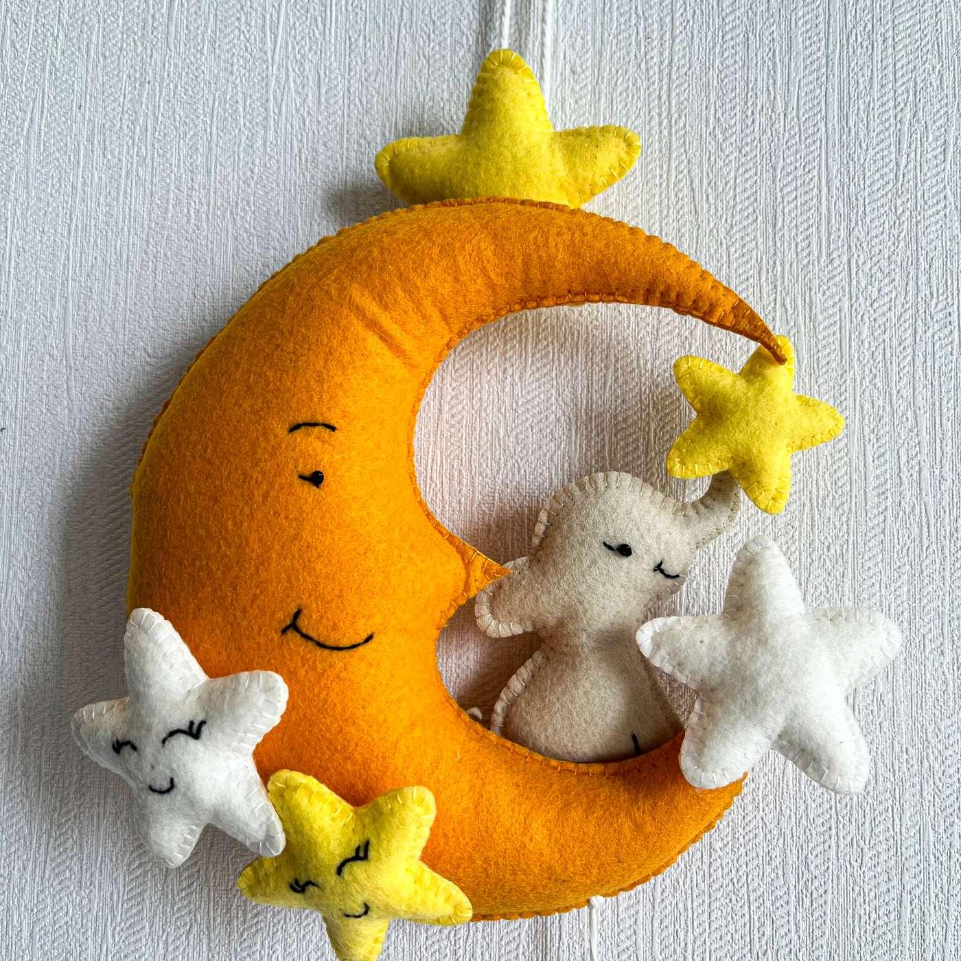Baby Ellie on a Moon Name Hanging