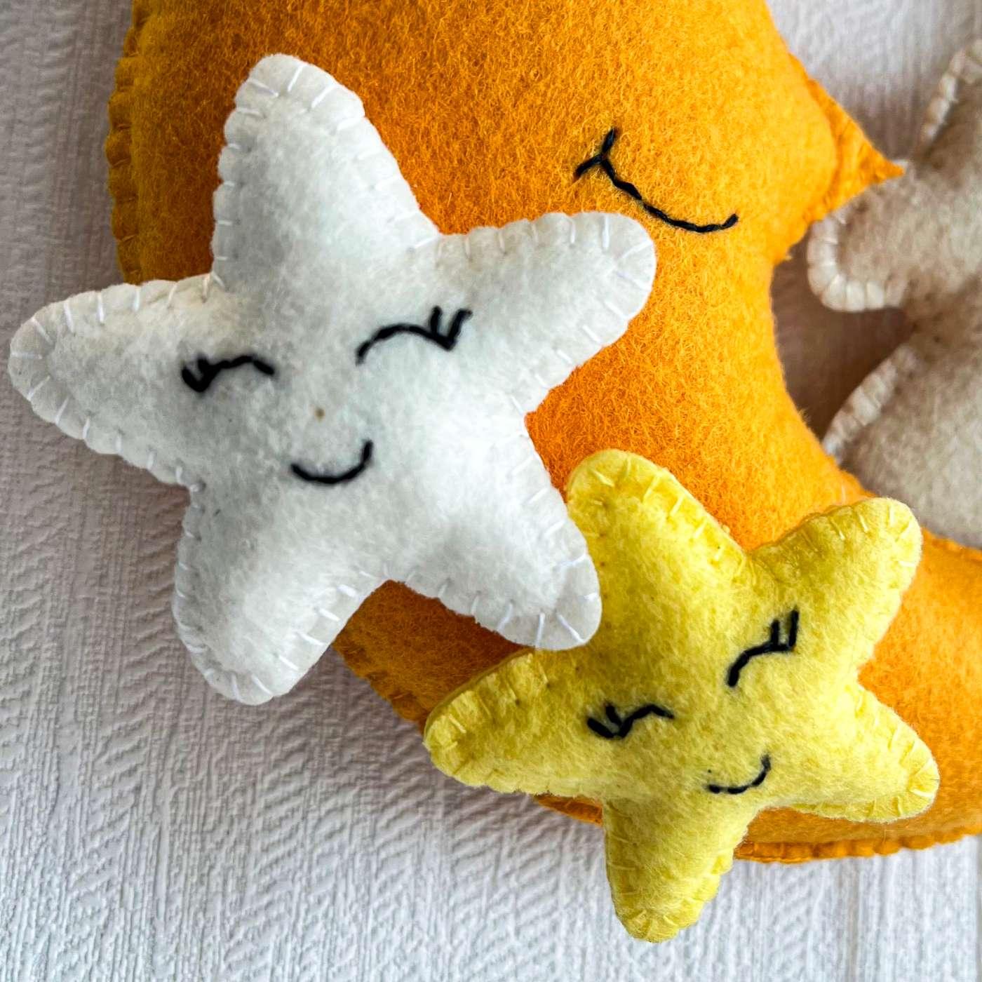 Baby Ellie on a Moon Name Hanging
