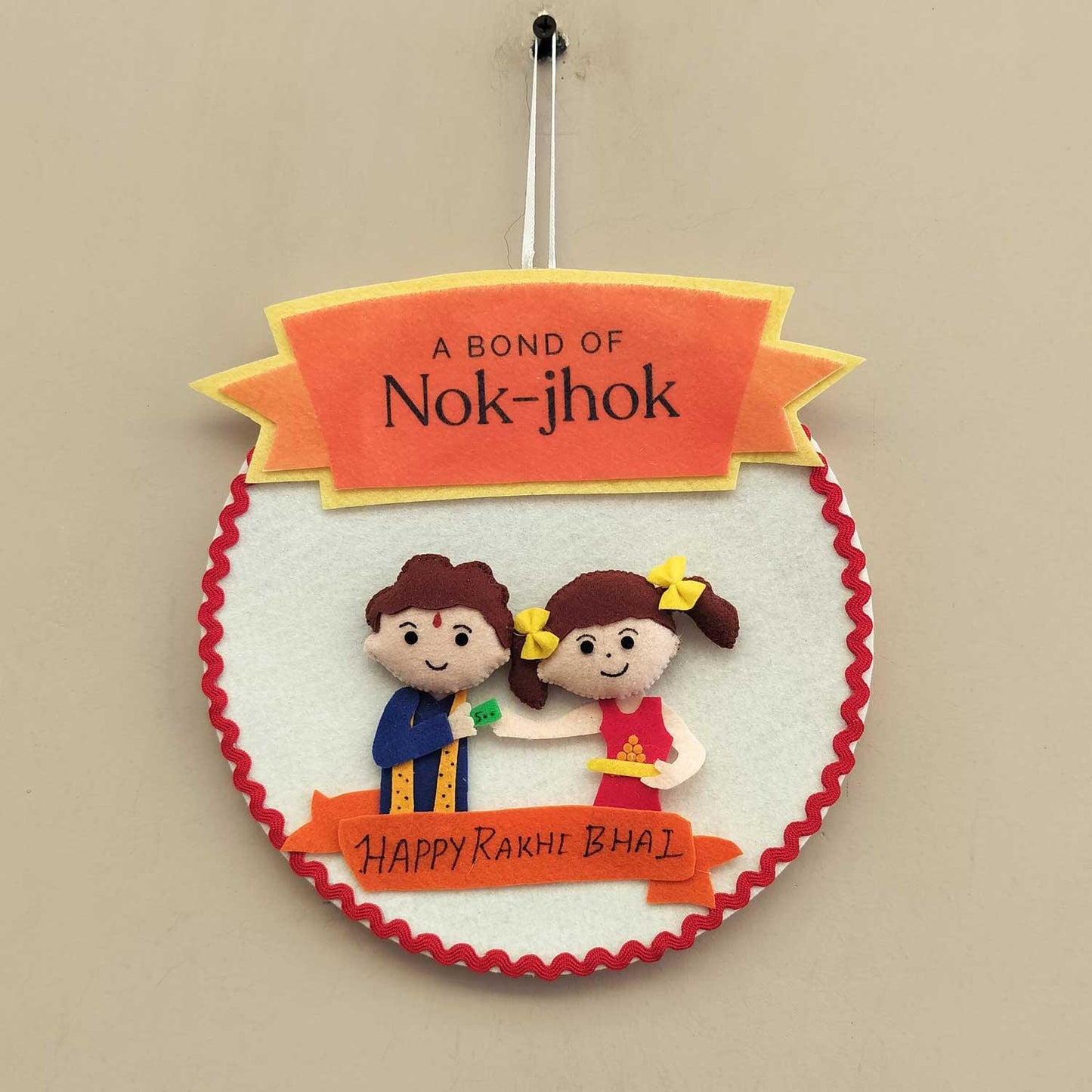 Nok-Jhok Felt Rakhi Wall Hanging