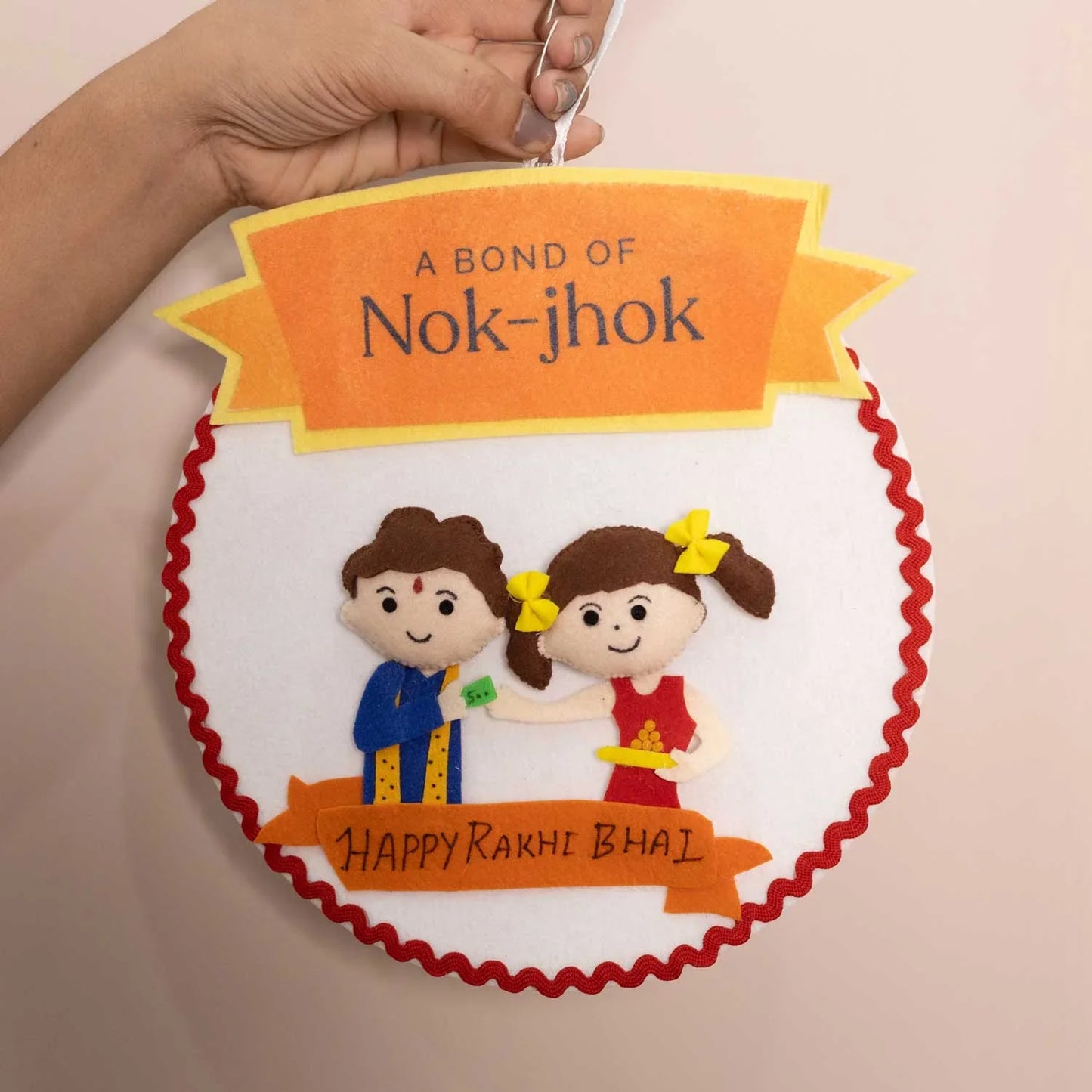 Nok-Jhok Felt Rakhi Wall Hanging