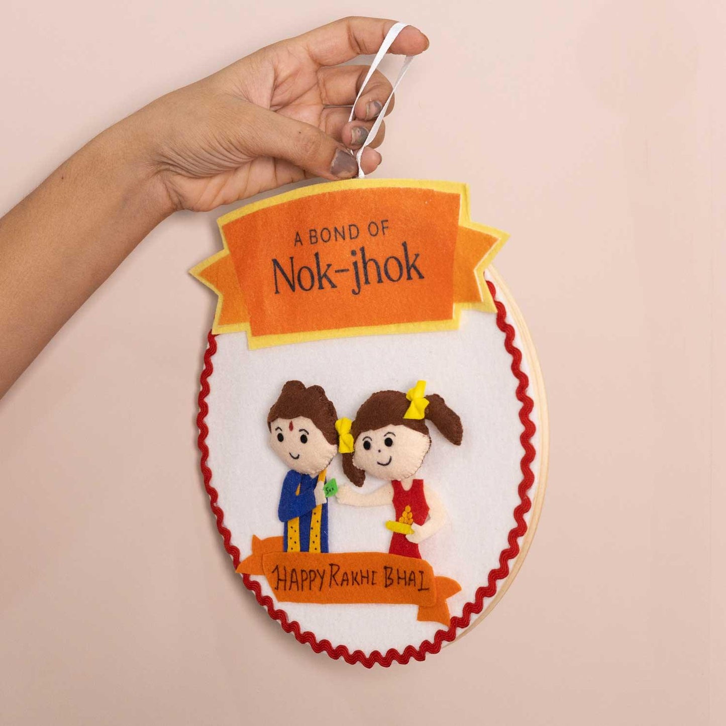 Nok-Jhok Felt Rakhi Wall Hanging