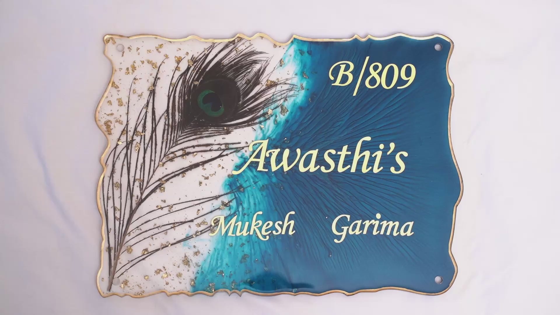 Close-up of the Bankapura Resin Nameplate with Peacock Feather
